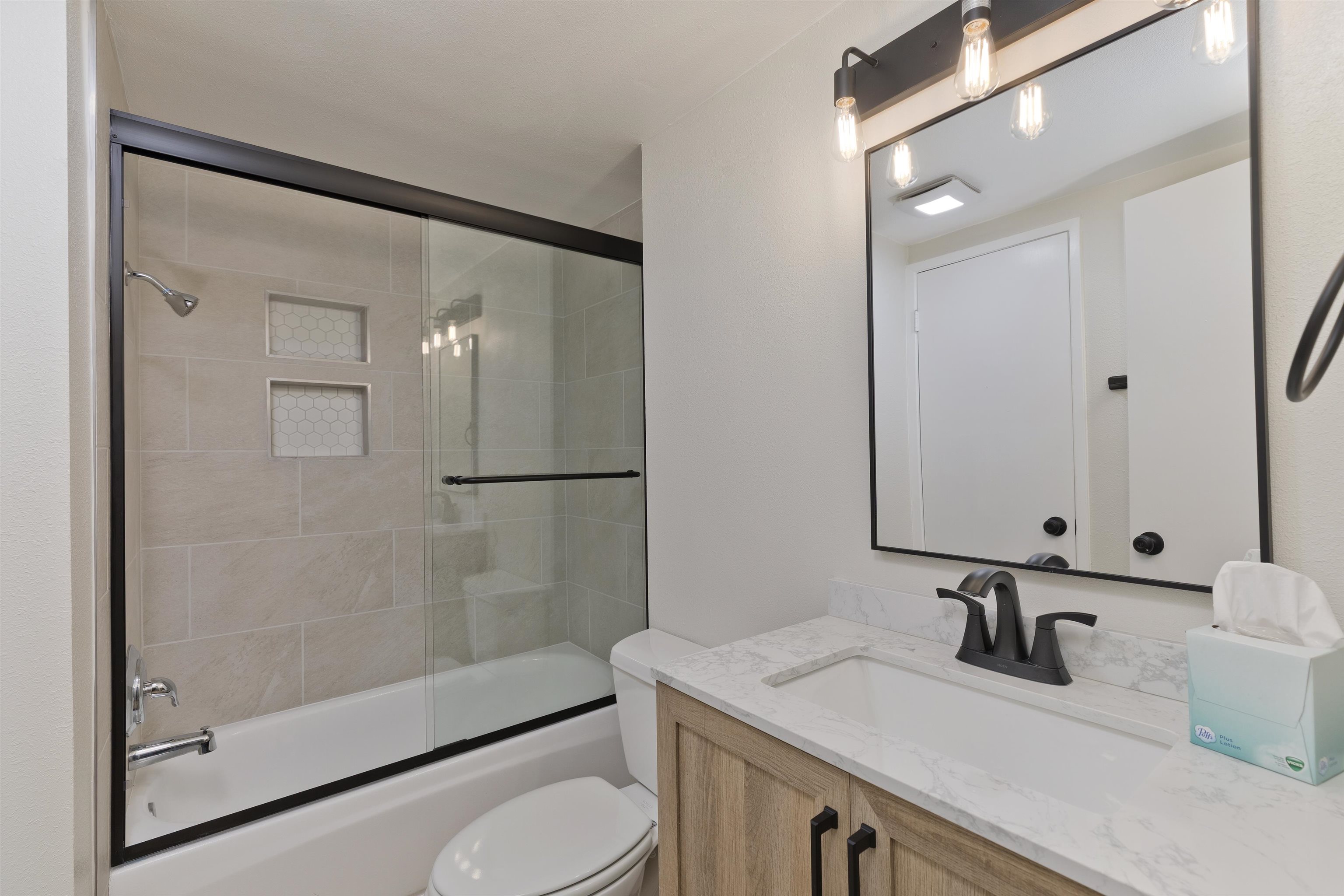 362 Old Mammoth Road, Unit 58 Mammoth Lakes, CA 93546 - Photo 16 of 26 a bathroom with a sink a toilet and shower