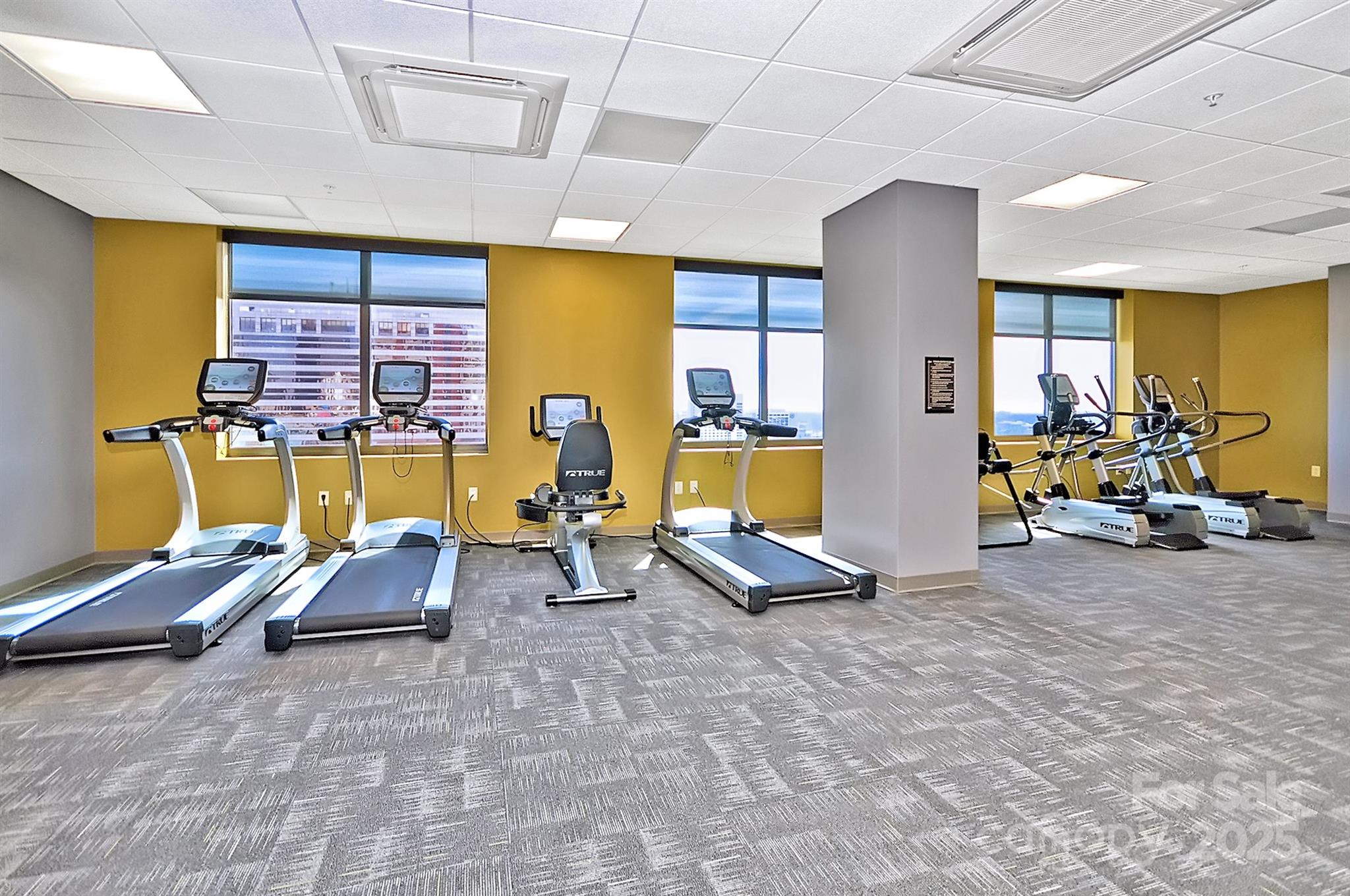 222 South Caldwell Street, Unit 1812 Charlotte, NC 28202 - Photo 34 of 37 a view of a room with gym equipment