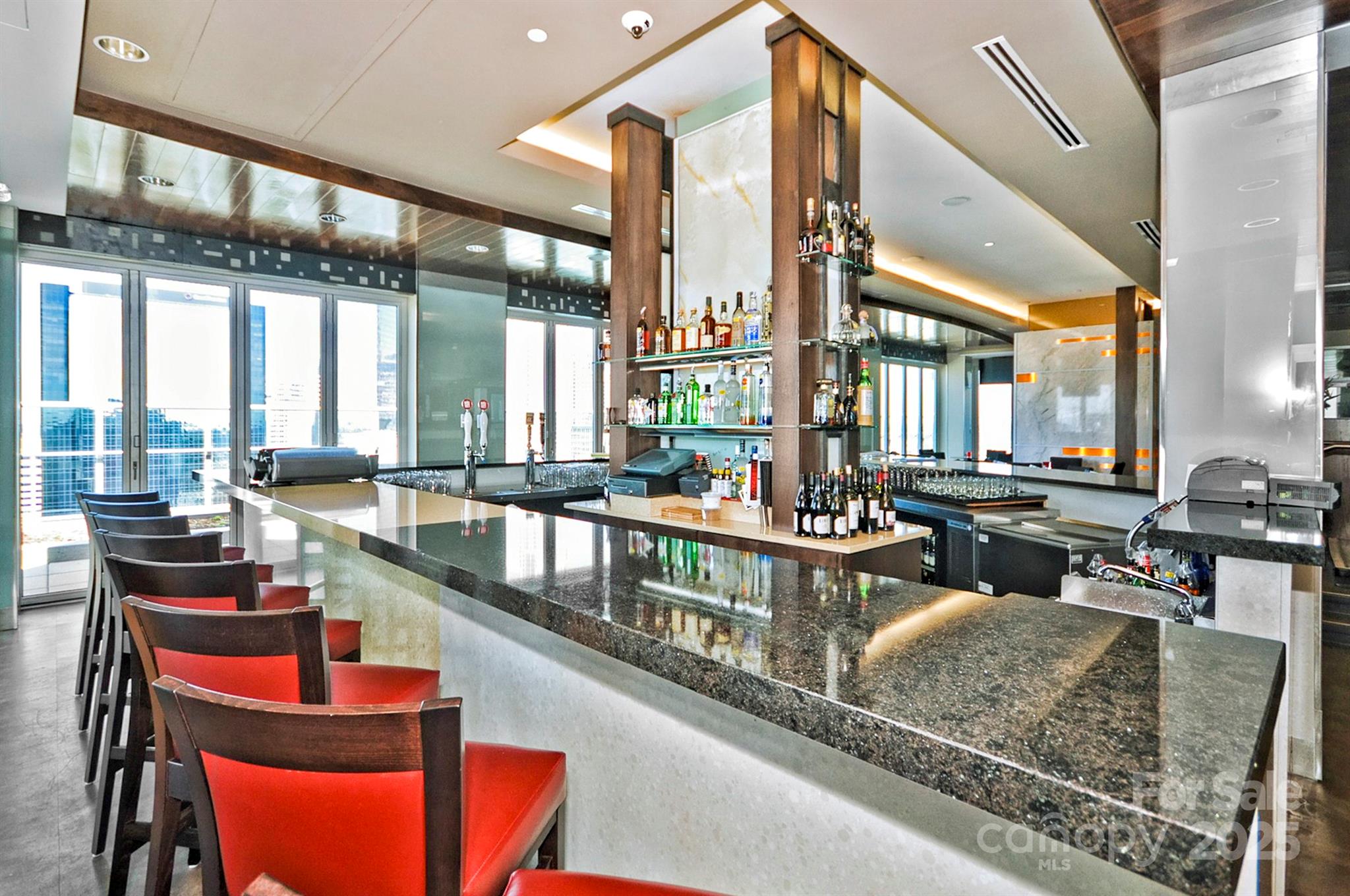 222 South Caldwell Street, Unit 1812 Charlotte, NC 28202 - Photo 36 of 37 a dining hall with large windows