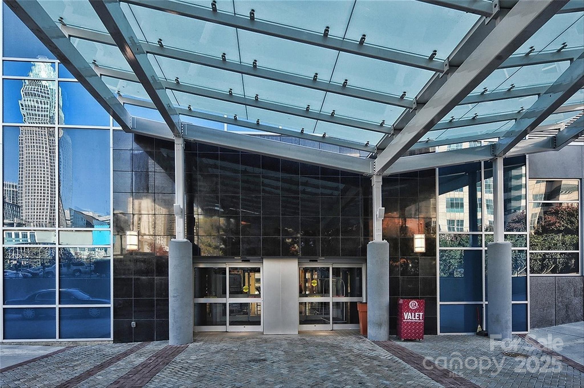 222 South Caldwell Street, Unit 1812 Charlotte, NC 28202 - Photo 5 of 37 a view of room with door