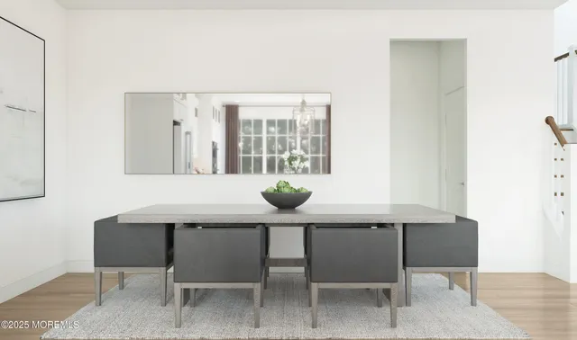 a kitchen with a table and chairs in it