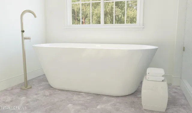 a close view of a bathtub in a bathroom