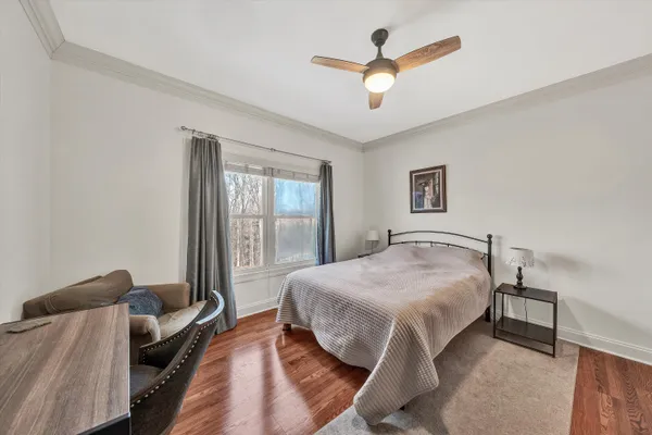 a bathroom with a double vanity sink mirror and shower