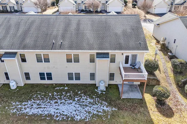 an aerial view of a house with a trees