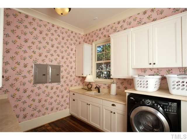 3026 Churchill Road Raleigh, NC 27607 - Photo 12 of 25 There is also a wrapping area in the laundry room.