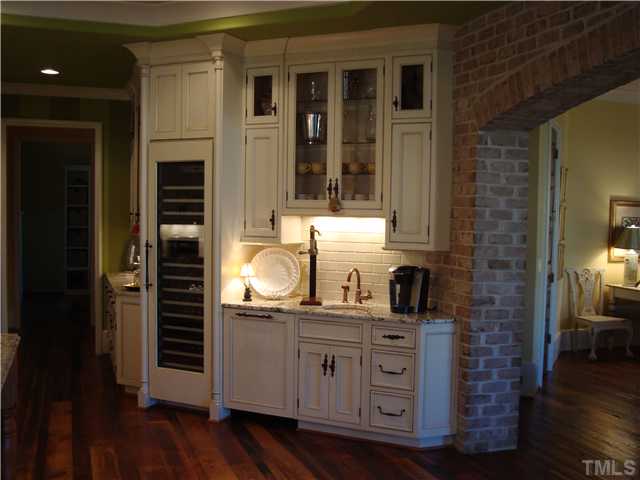 3026 Churchill Road Raleigh, NC 27607 - Photo 25 of 25 Bar area in the kitchen features a Thermador wine cooler with two temperature settings.
