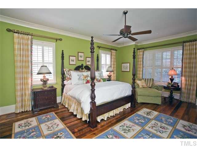 3026 Churchill Road Raleigh, NC 27607 - Photo 3 of 25 Beautiful master bedroom with reclaimed tobacco barn heart pine flooring.