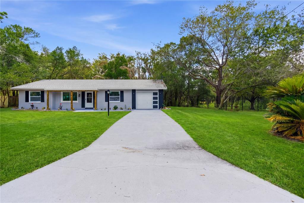4446 Watt Avenue Spring Hill, FL 34608 - Photo 1 of 37