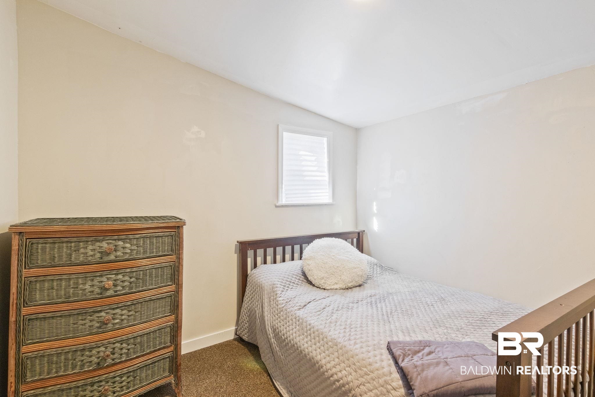 707 North Cedar Street Foley, AL 36535 - Photo 37 of 69 Carpeted bedroom featuring vaulted ceiling