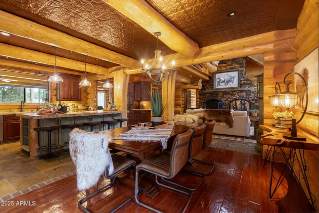 a bed room with a bed and a chandelier