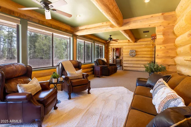 a bathroom with a granite countertop sink a mirror and shower