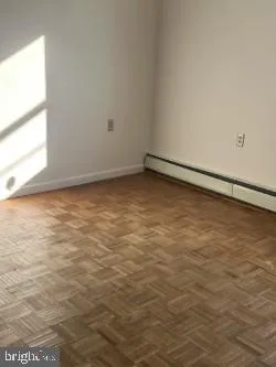 a bathroom with a glass door