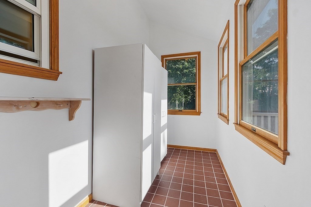 70 Park Avenue Stoneham, MA 02180 - Photo 11 of 36 a view of a hallway with windows