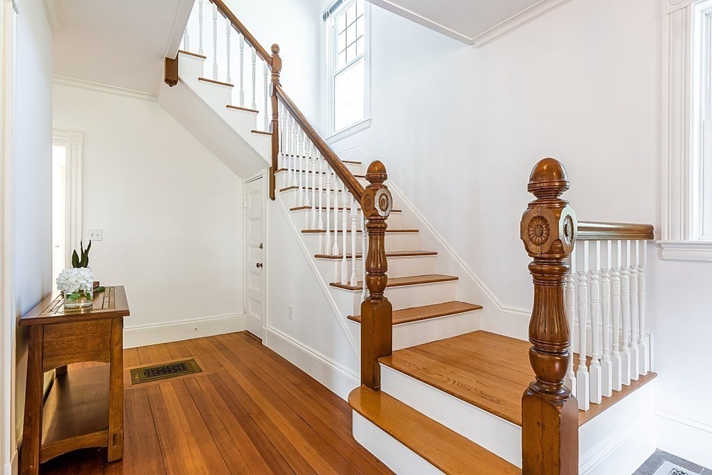 70 Park Avenue Stoneham, MA 02180 - Photo 12 of 36 a view of entryway and hall with wooden floor