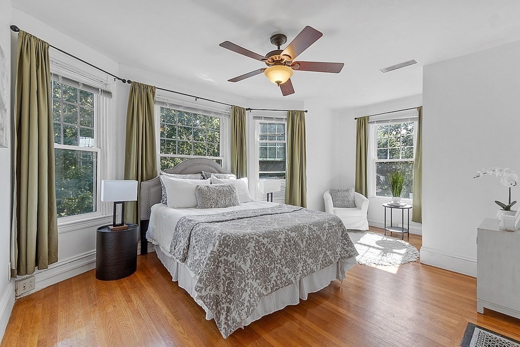 70 Park Avenue Stoneham, MA 02180 - Photo 13 of 36 a bedroom with a large bed and a large window