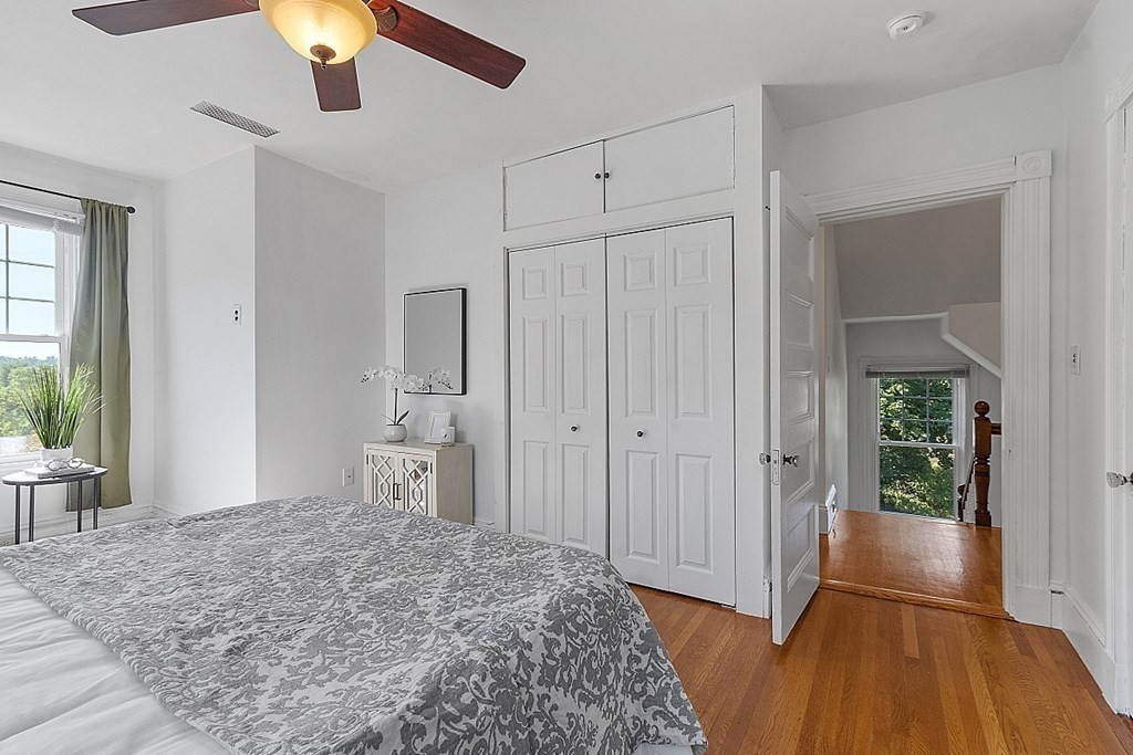 70 Park Avenue Stoneham, MA 02180 - Photo 15 of 36 a bedroom with a bed and a window