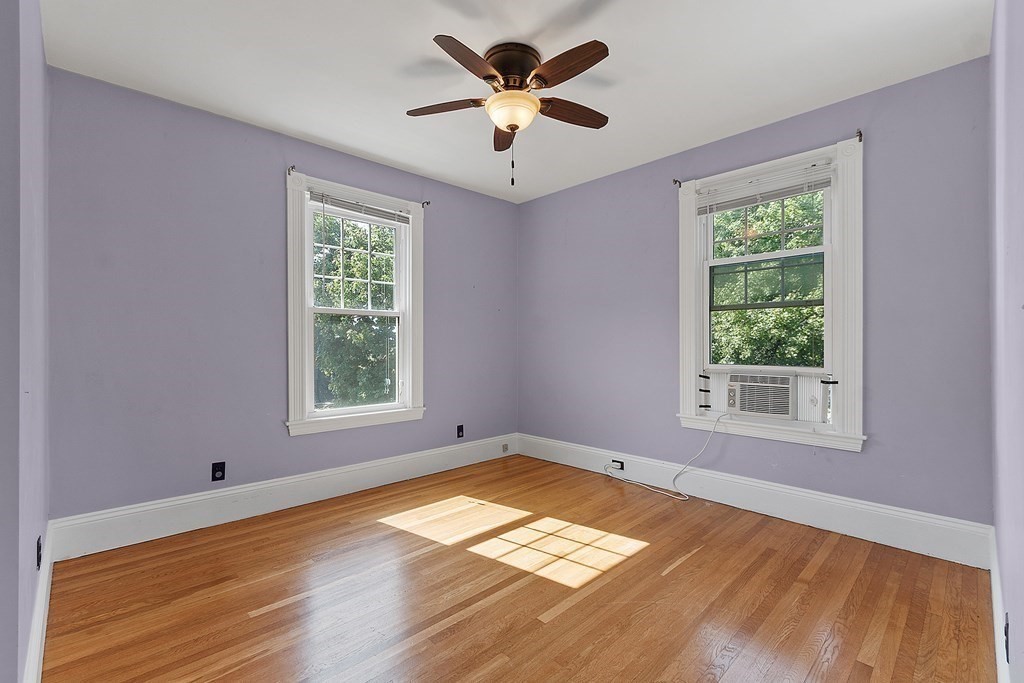 70 Park Avenue Stoneham, MA 02180 - Photo 18 of 36 a view of empty room with wooden floor and fan