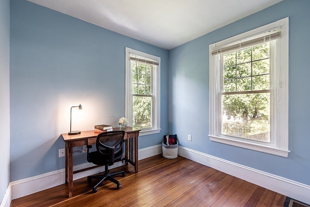 70 Park Avenue Stoneham, MA 02180 - Photo 20 of 36 a view of a workspace with furniture and a window