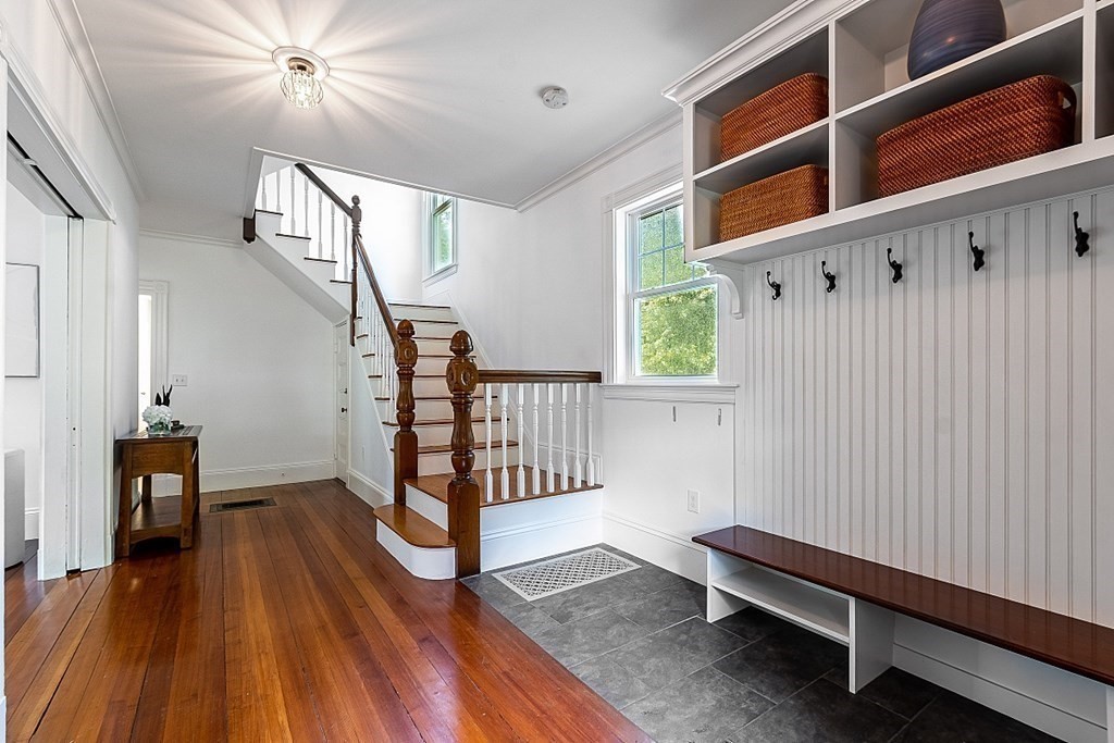 70 Park Avenue Stoneham, MA 02180 - Photo 2 of 36 a view of a livingroom with furniture and hardwood floor