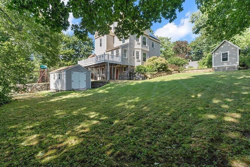 70 Park Avenue Stoneham, MA 02180 - Photo 28 of 36 a view of a house with a big yard