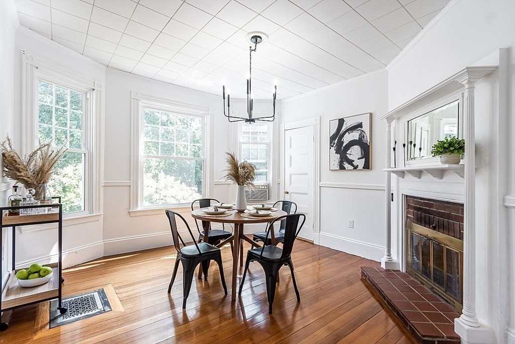 70 Park Avenue Stoneham, MA 02180 - Photo 6 of 36 a view of a dining room with furniture window and wooden floor