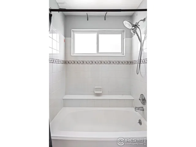 a bathroom with a bathtub