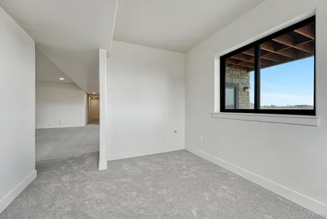 a view of backyard with a deck