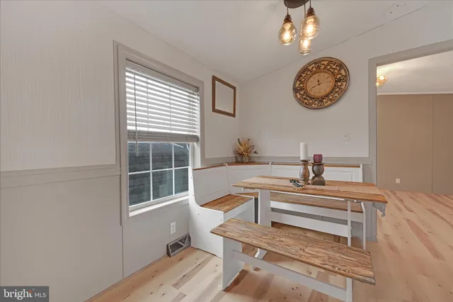 a view of a storage and utility room with a window