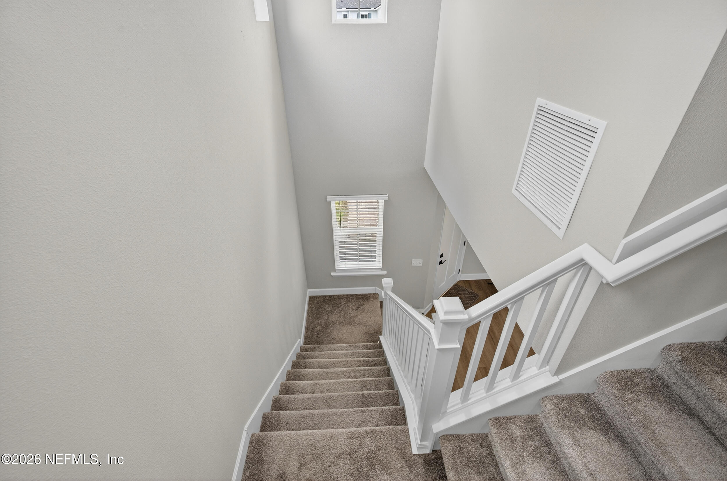 57 Cedar Elm Way St. Augustine, FL 32092 - Photo 26 of 65 a view of a hallway with stairs