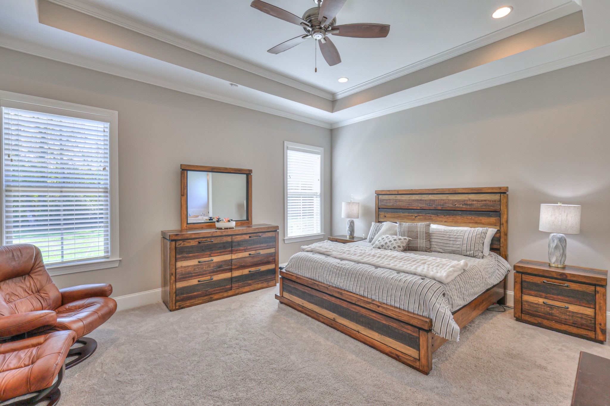 8019 Burning Tree Farms Road Arrington, TN 37014 - Photo 13 of 47 a bedroom with a bed and a couch