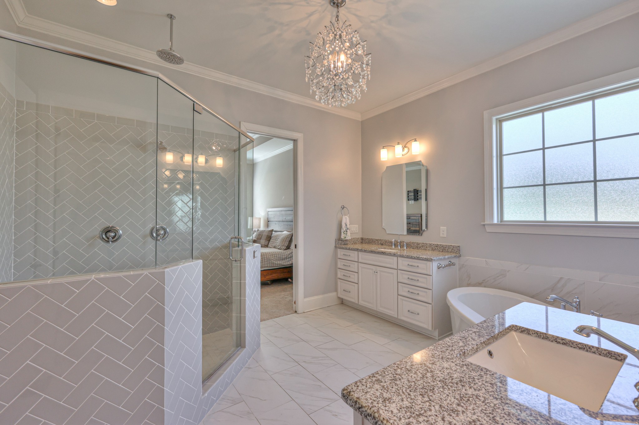 8019 Burning Tree Farms Road Arrington, TN 37014 - Photo 15 of 47 a spacious bathroom with a granite countertop sink a toilet a mirror and shower