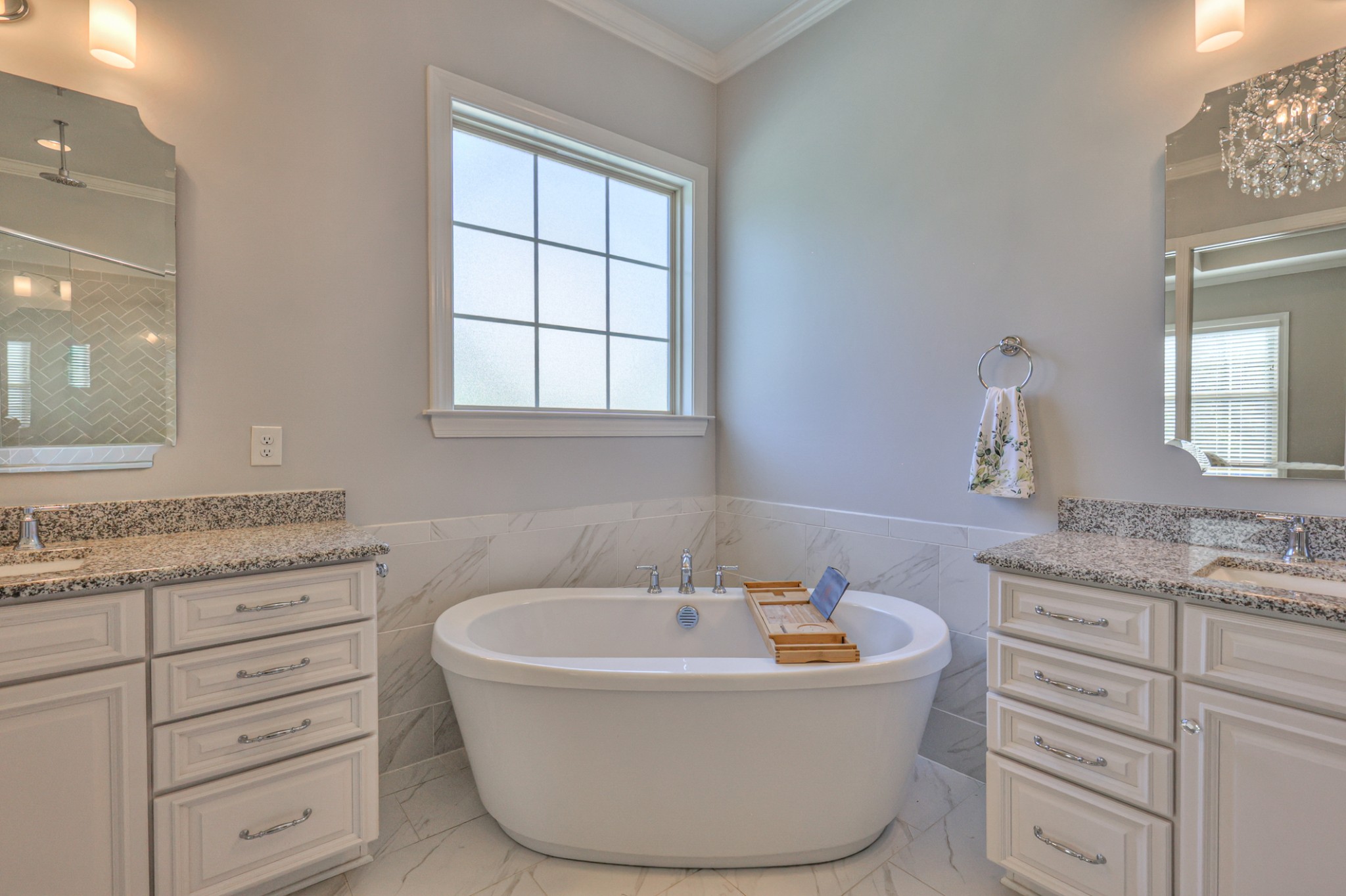 8019 Burning Tree Farms Road Arrington, TN 37014 - Photo 16 of 47 a bathroom with a bathtub sink and mirror
