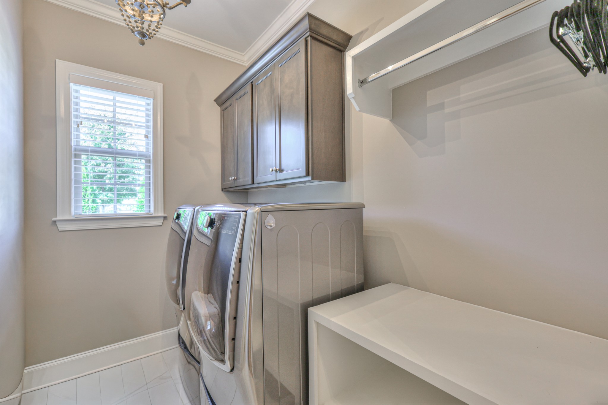 8019 Burning Tree Farms Road Arrington, TN 37014 - Photo 23 of 47 a utility room with dryer and washer