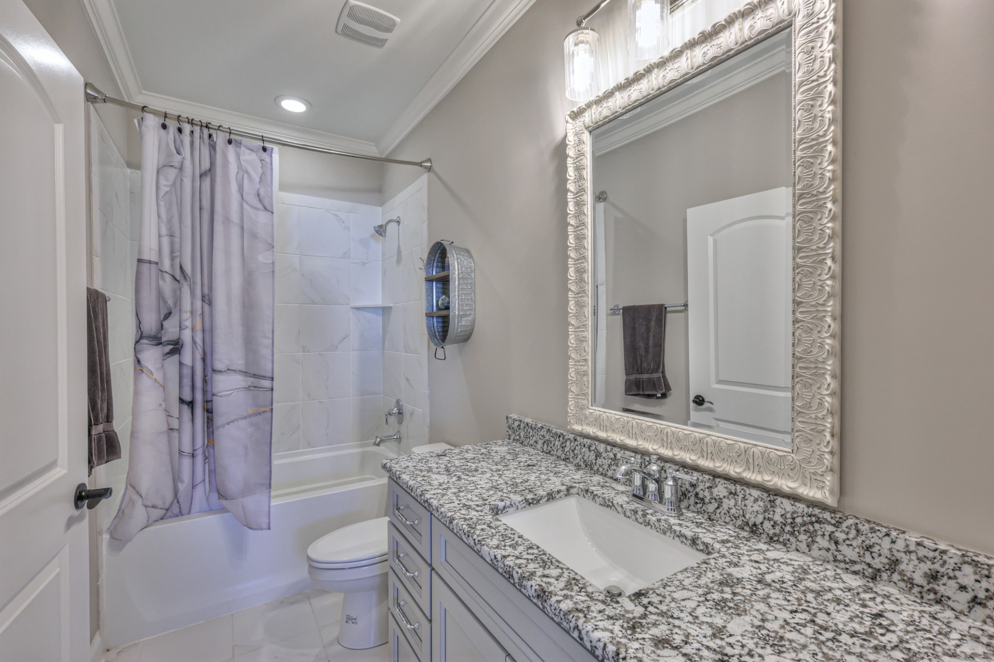 8019 Burning Tree Farms Road Arrington, TN 37014 - Photo 27 of 47 a bathroom with a granite countertop sink toilet mirror and shower