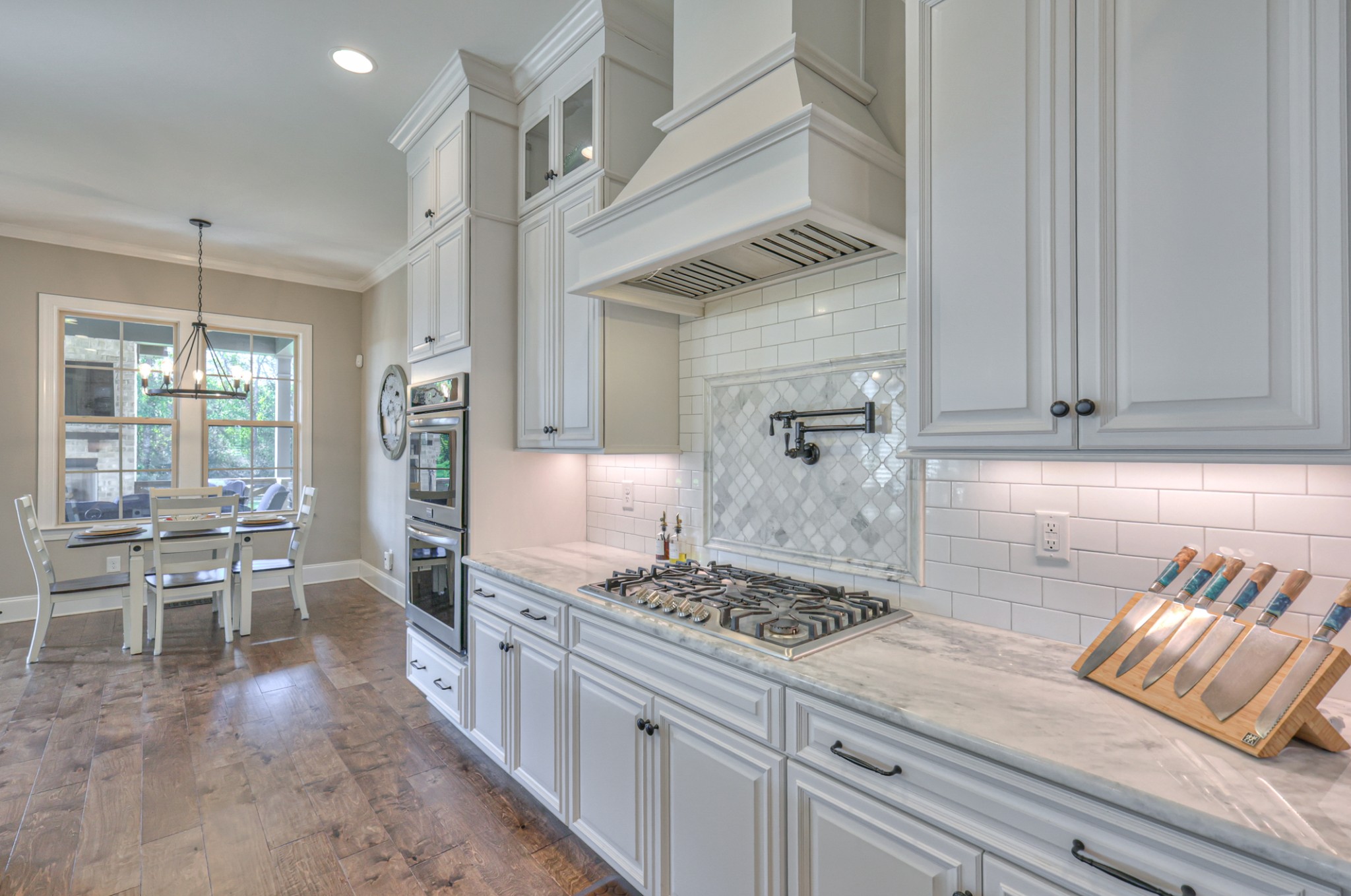 8019 Burning Tree Farms Road Arrington, TN 37014 - Photo 3 of 47 a kitchen with stainless steel appliances granite countertop a stove and a refrigerator