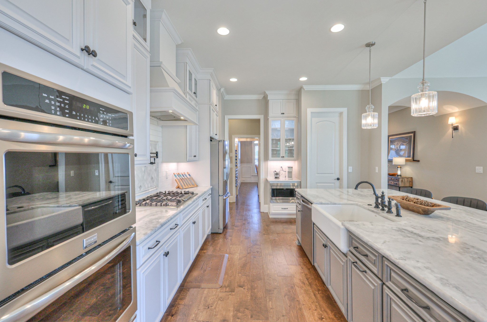 8019 Burning Tree Farms Road Arrington, TN 37014 - Photo 4 of 47 a large kitchen with granite countertop a large counter top appliances and cabinets