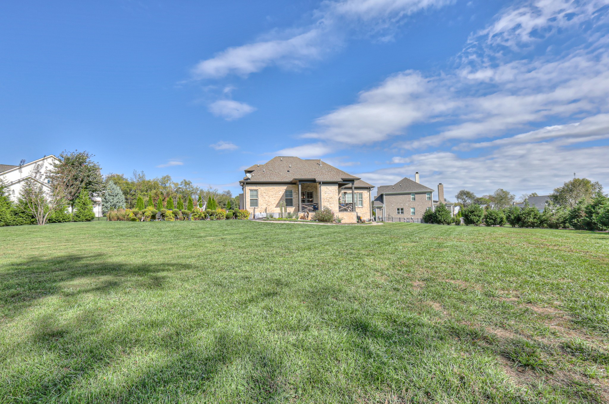 8019 Burning Tree Farms Road Arrington, TN 37014 - Photo 42 of 47 a front view of a house with garden