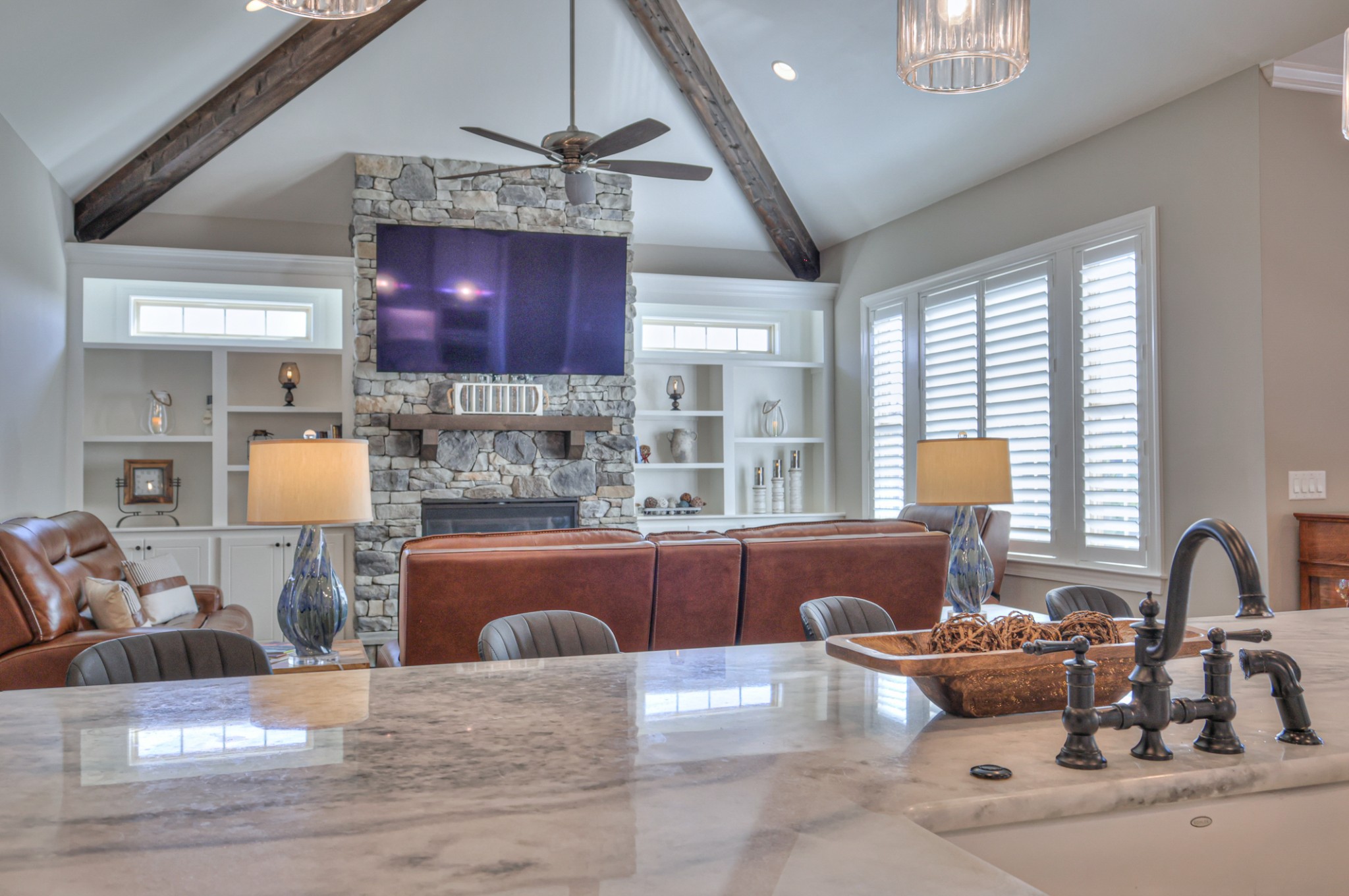 8019 Burning Tree Farms Road Arrington, TN 37014 - Photo 7 of 47 a kitchen with stainless steel appliances granite countertop a sink dishwasher a stove and a dining table with wooden cabinet