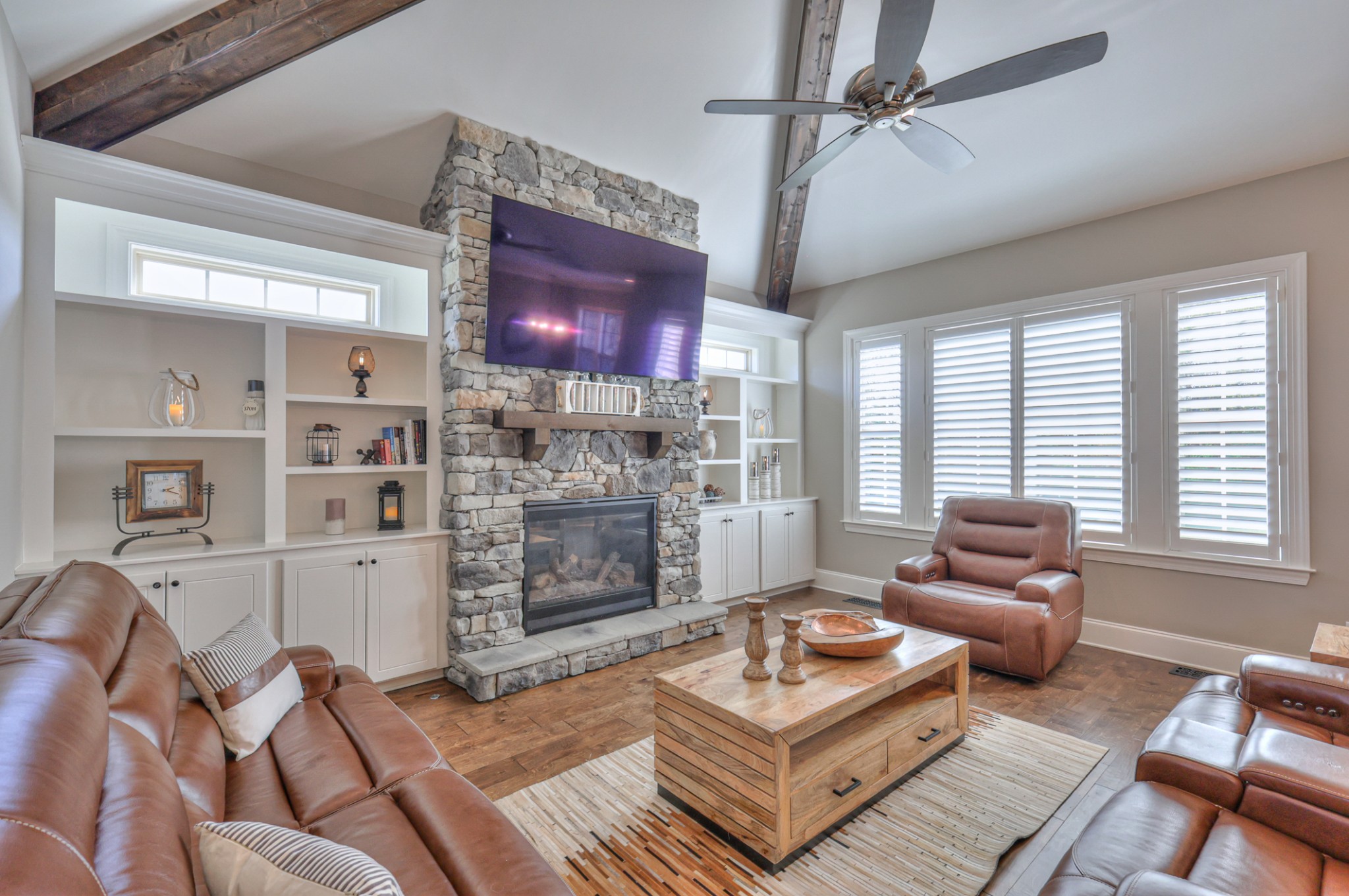 8019 Burning Tree Farms Road Arrington, TN 37014 - Photo 8 of 47 a living room with furniture and a fireplace