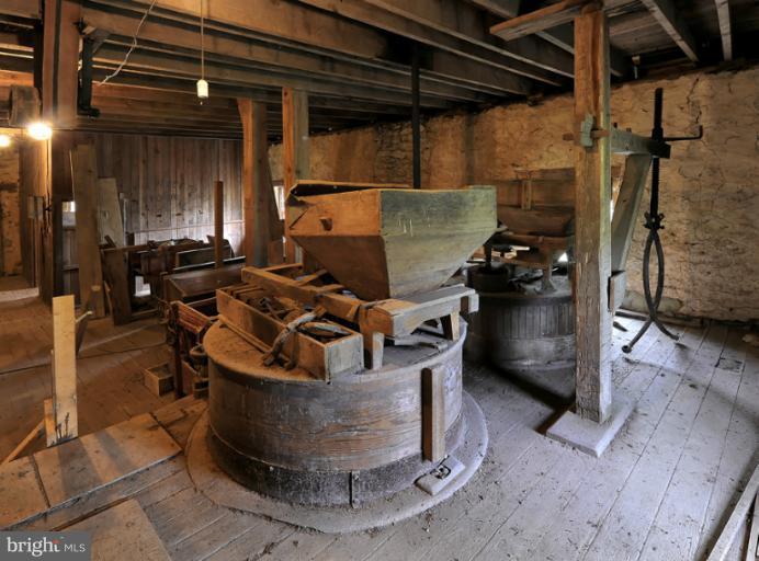 2648 Rectortown Road Delaplane, VA 20144 - Photo 13 of 25 Interior of grist mill with mill stones intact.