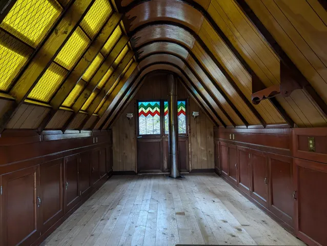 a view of a door with wooden floor
