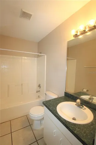 a view of room and racks on the wall