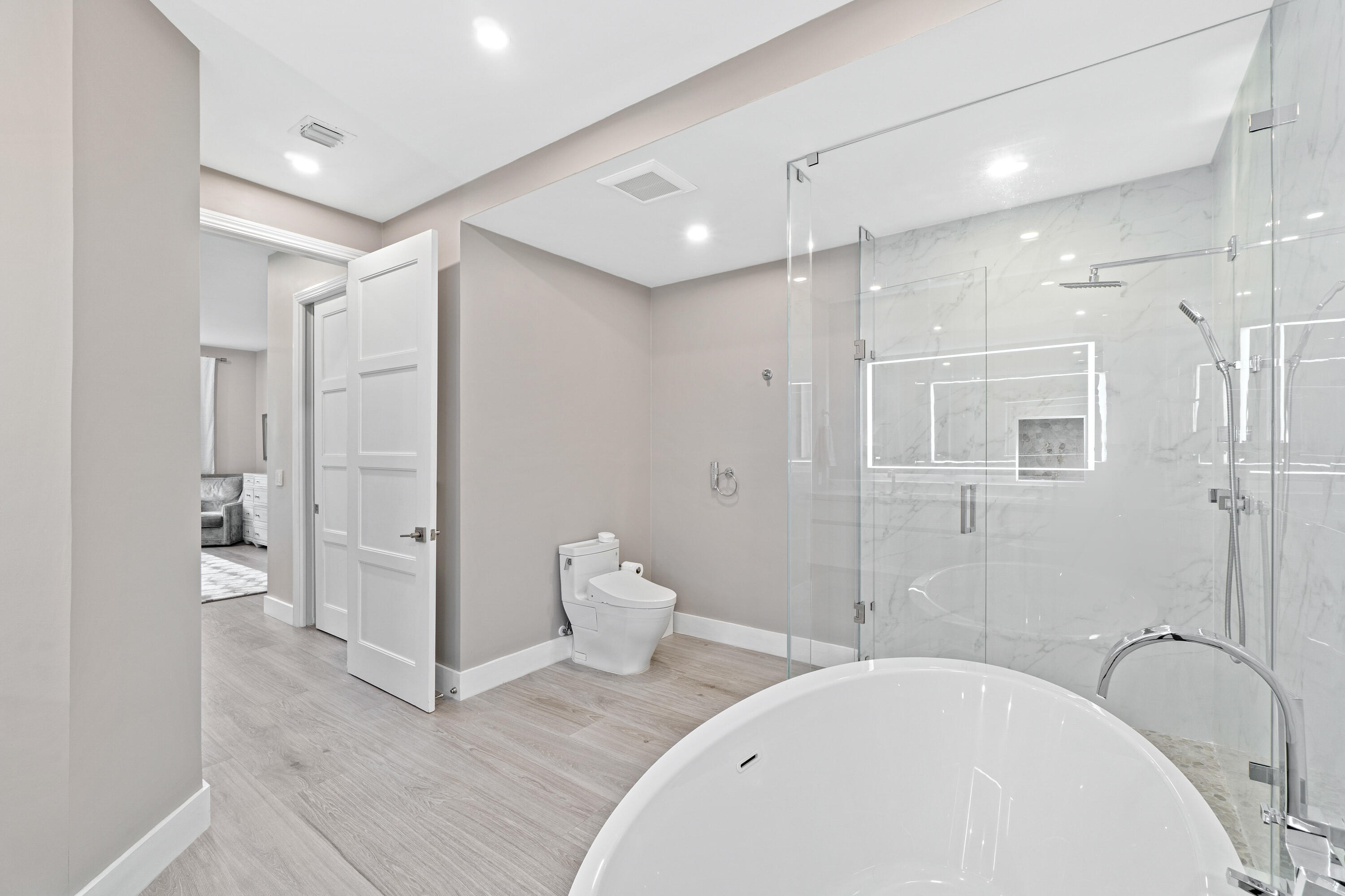 6308 Graycliff Drive, Unit B Boca Raton, FL 33496 - Photo 21 of 29 a bathroom with a bathtub shower sink and toilet