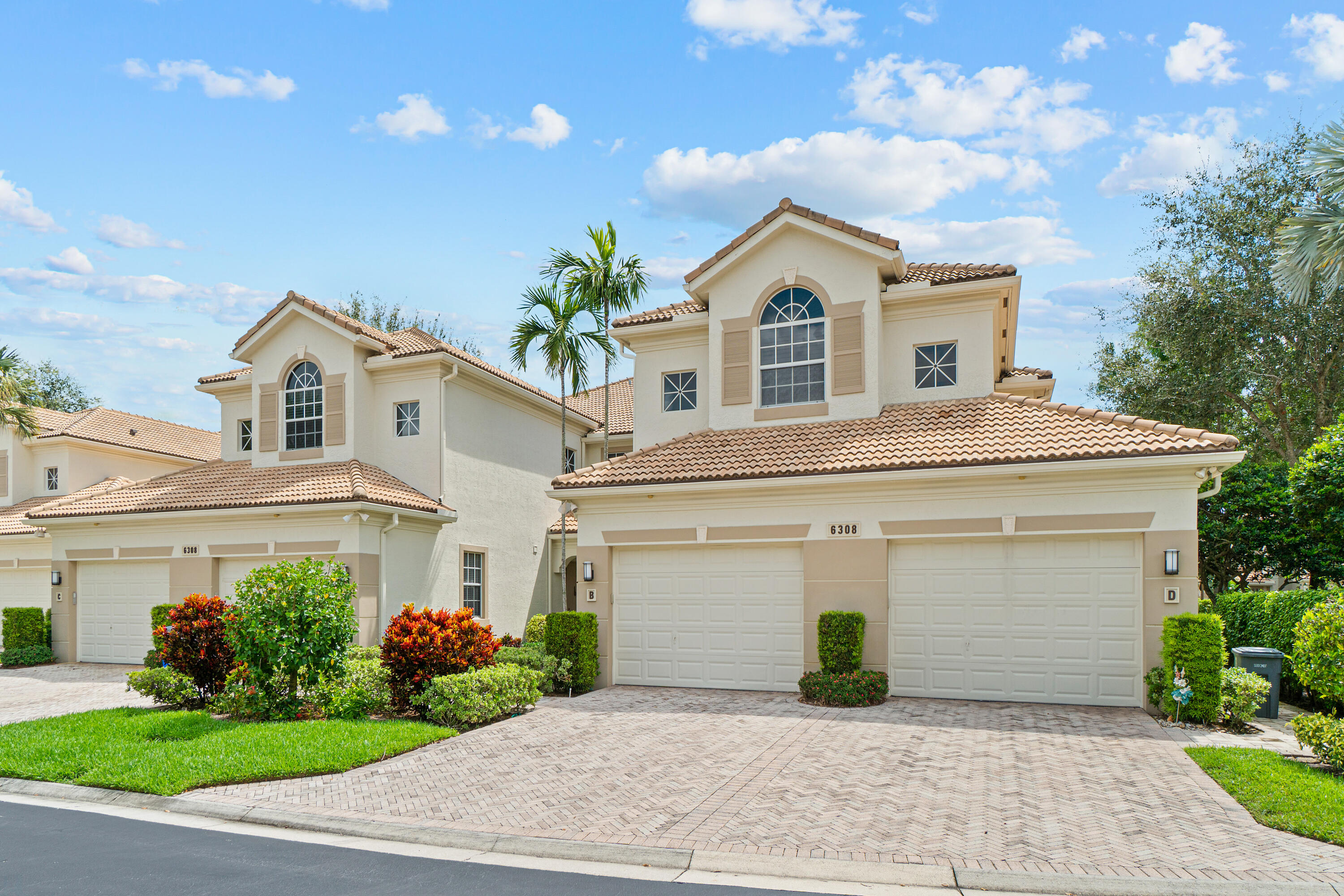 6308 Graycliff Drive, Unit B Boca Raton, FL 33496 - Photo 25 of 29 a view of house with garden and garage