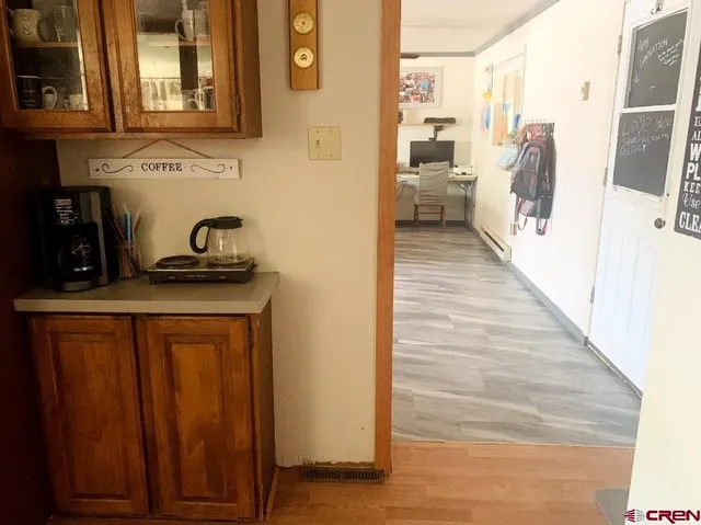a kitchen with stainless steel appliances granite countertop a stove and a refrigerator