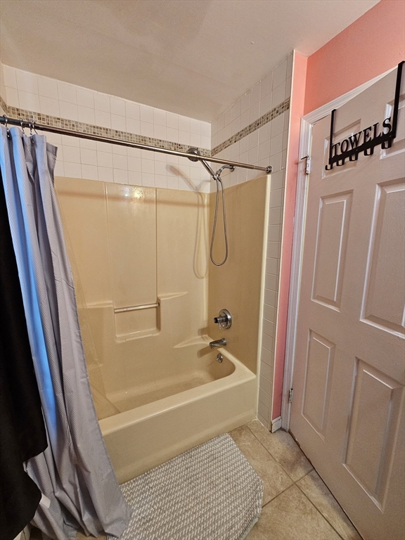 32 Crowell Street Boston, MA 02124 - Photo 11 of 18 a bathroom with a bathtub and a shower