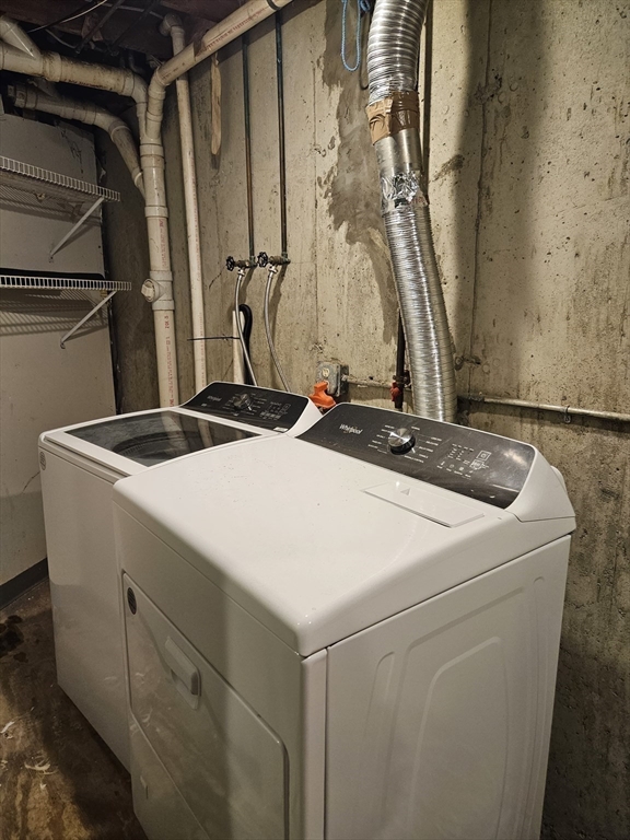 32 Crowell Street Boston, MA 02124 - Photo 16 of 18 a utility room with dryer and washer