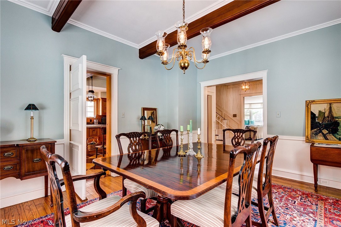 13753 County Line Road Novelty, OH 44072 - Photo 11 of 31 Beams and wainscoting accent the dining room providing an air of formality.