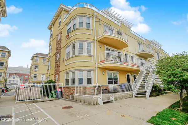 a front view of a multi story residential apartment building
