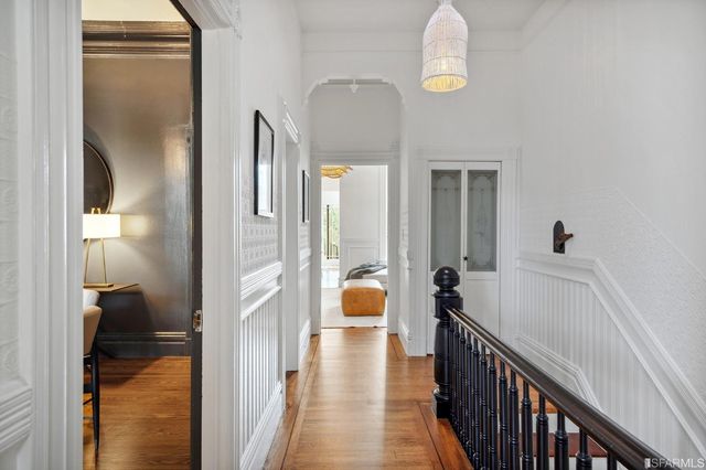 a view of a bathroom from the hallway
